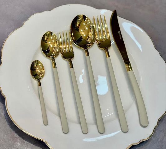 36 Piece Cutlery set.  Cream and Gold